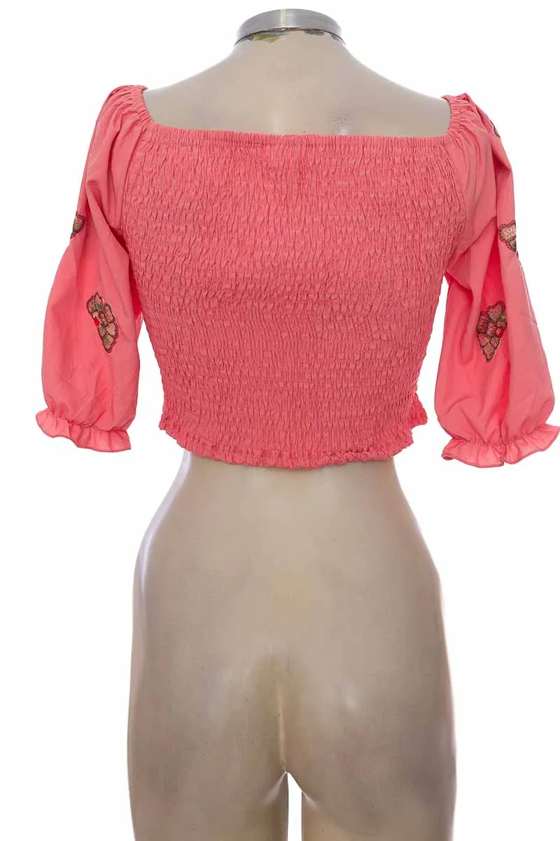 BLUSA COLOR ROSADO  BONITA