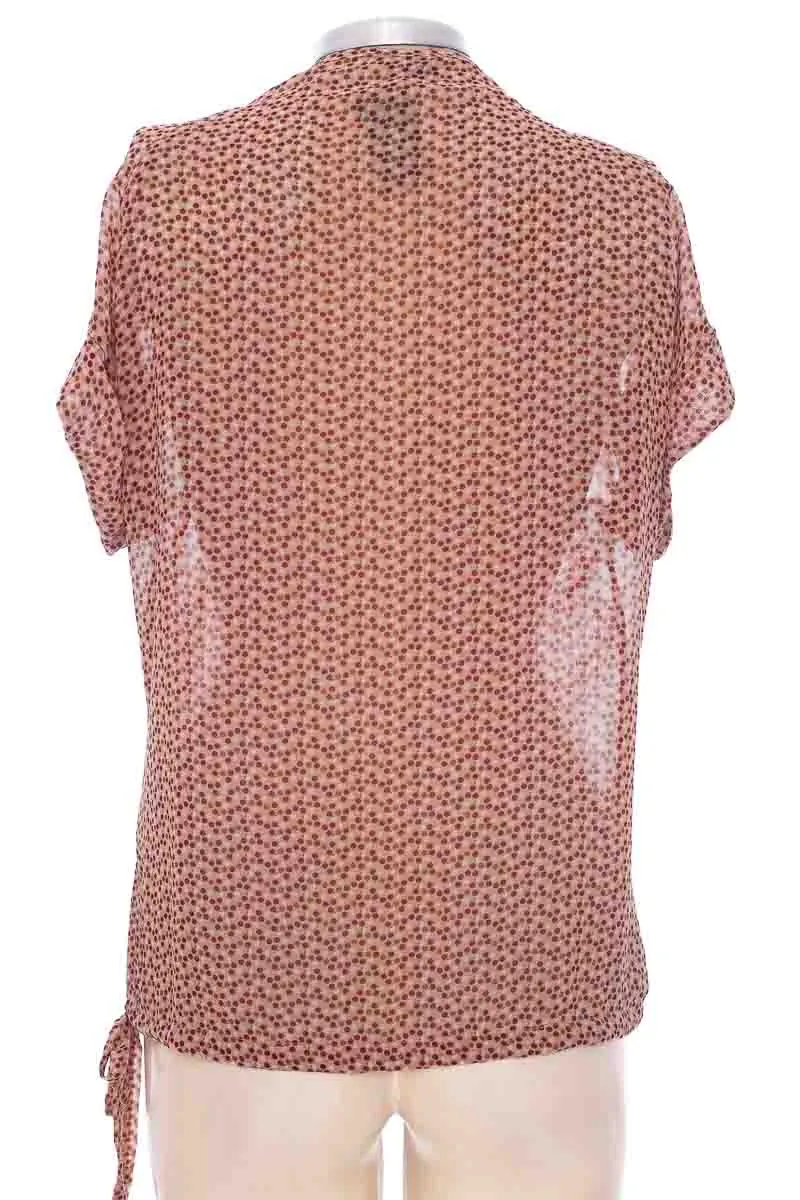 BLUSA COLOR ROSADO  CHEVIGNON
