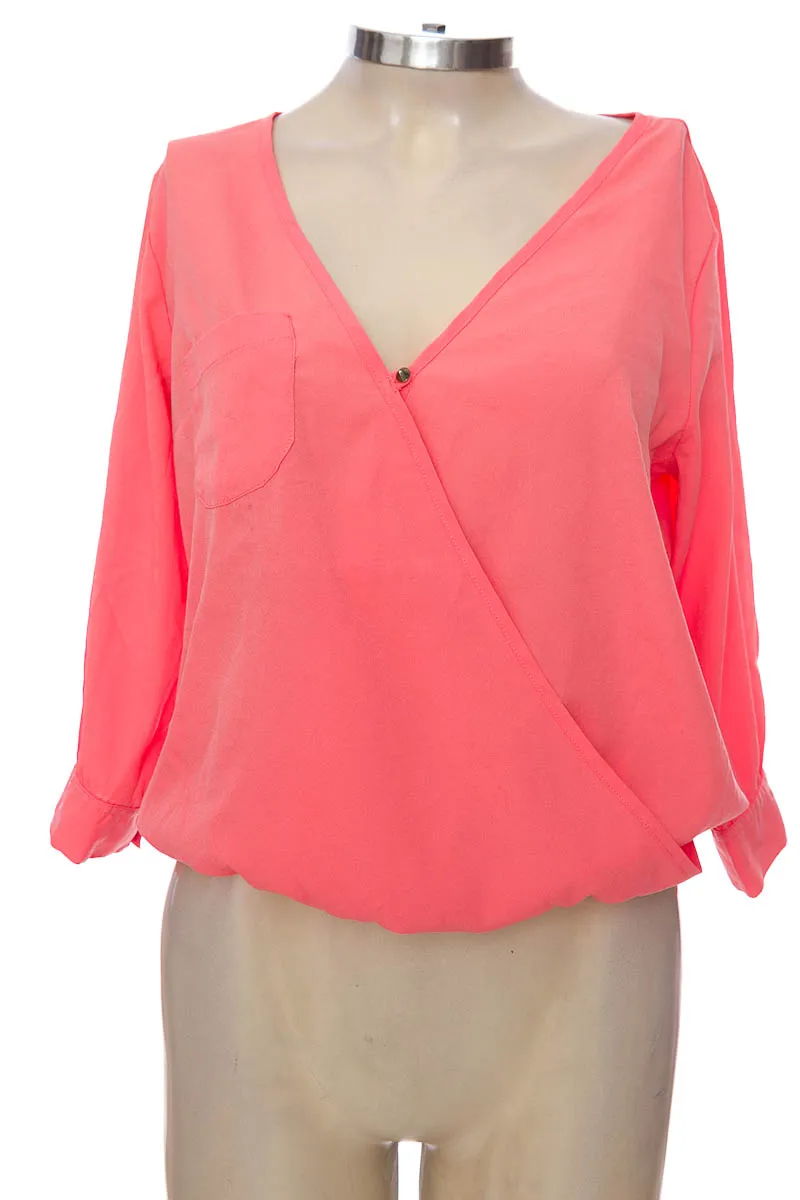 BLUSA COLOR ROSADO  RAGGED