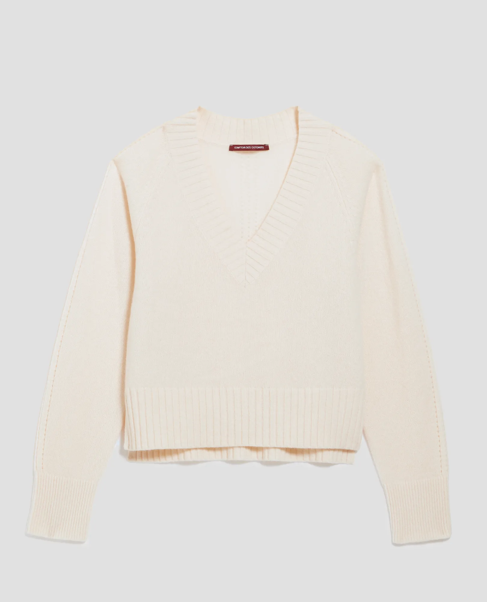 Jersey con cuello de pico de cachemir pearled ivory